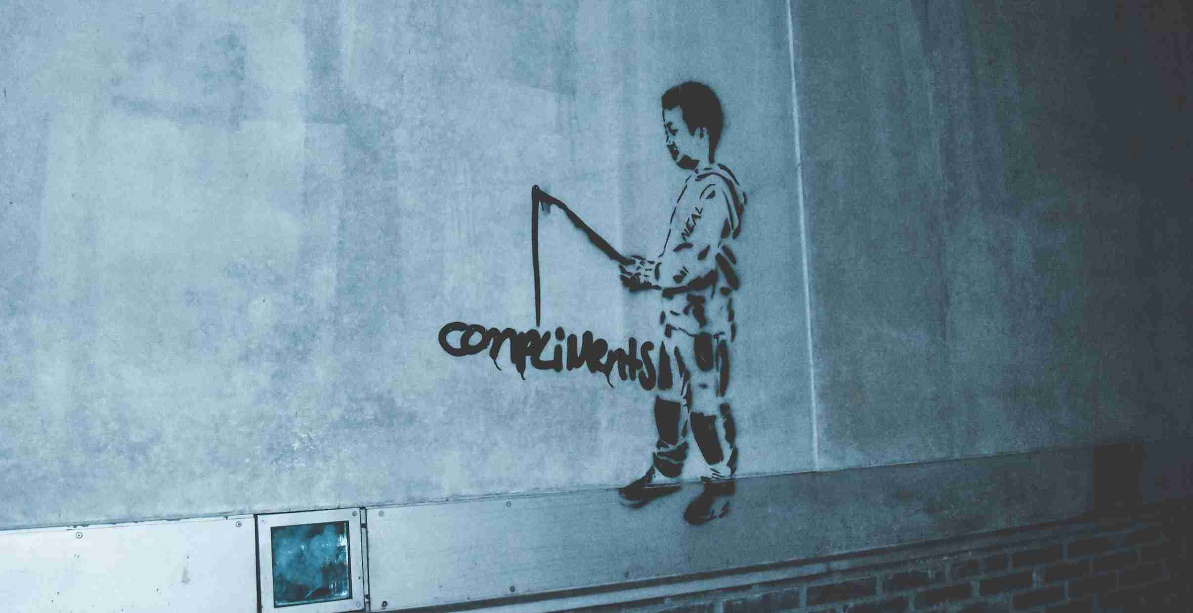 bansky-man-vist-naar-complimenten